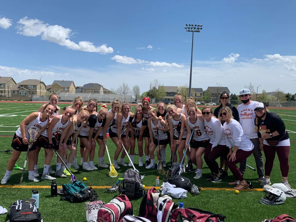 Priya Prince with a lacrosse team
