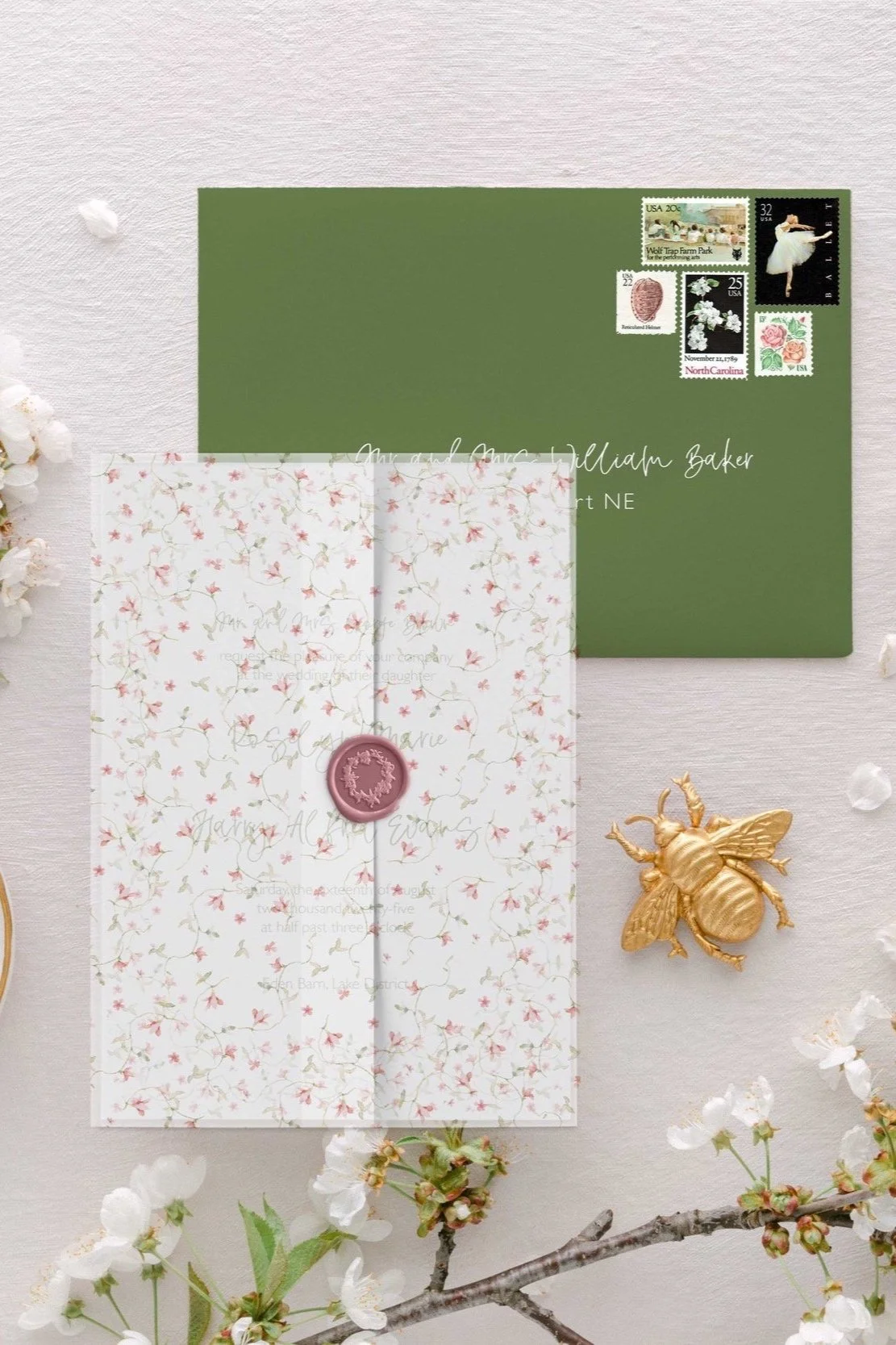 Roselyn wedding invitation wrapped in vellum and finished with a wax seal for an elegant presentation.