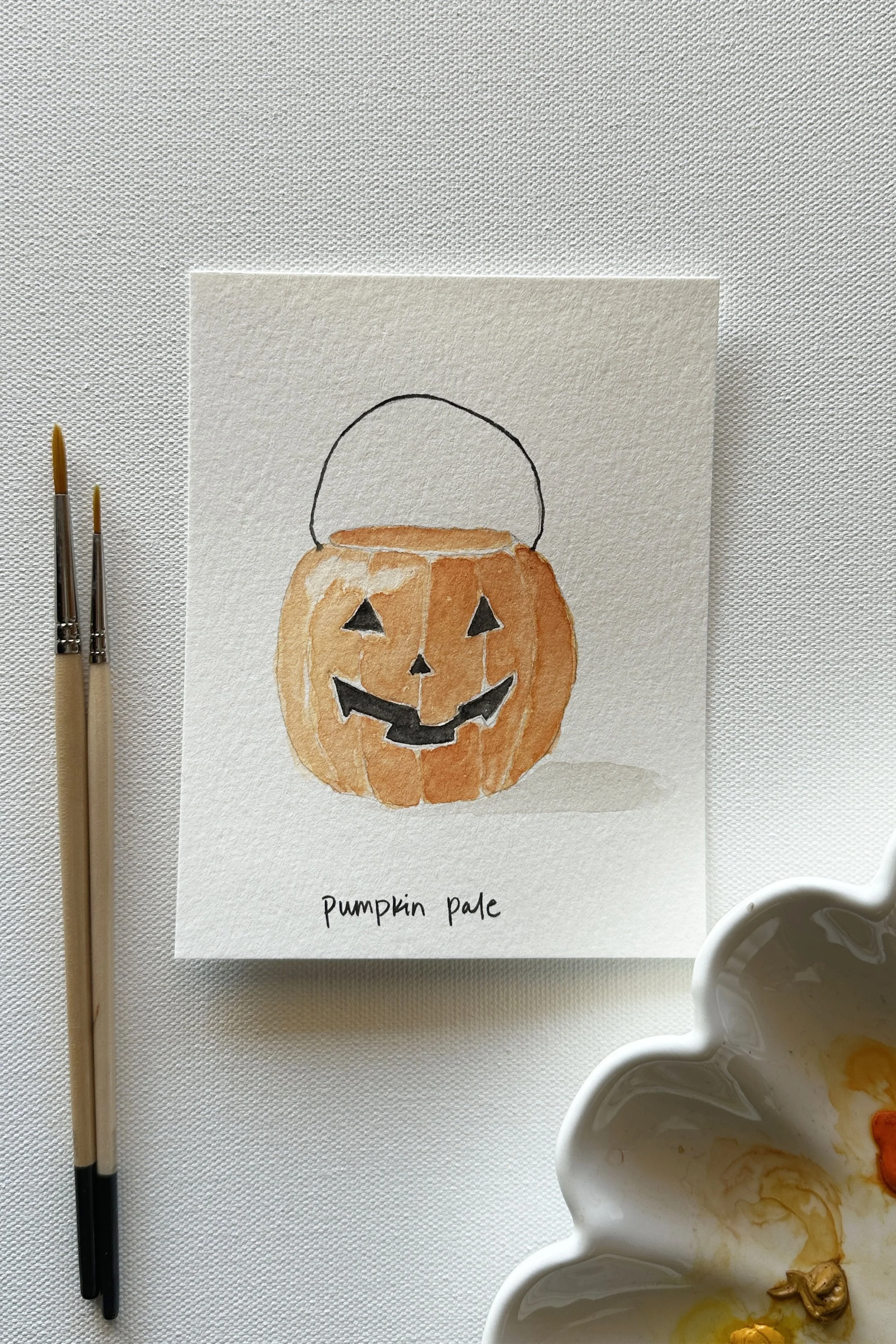 A watercolor pumpkin painted for the October Halloween theme.