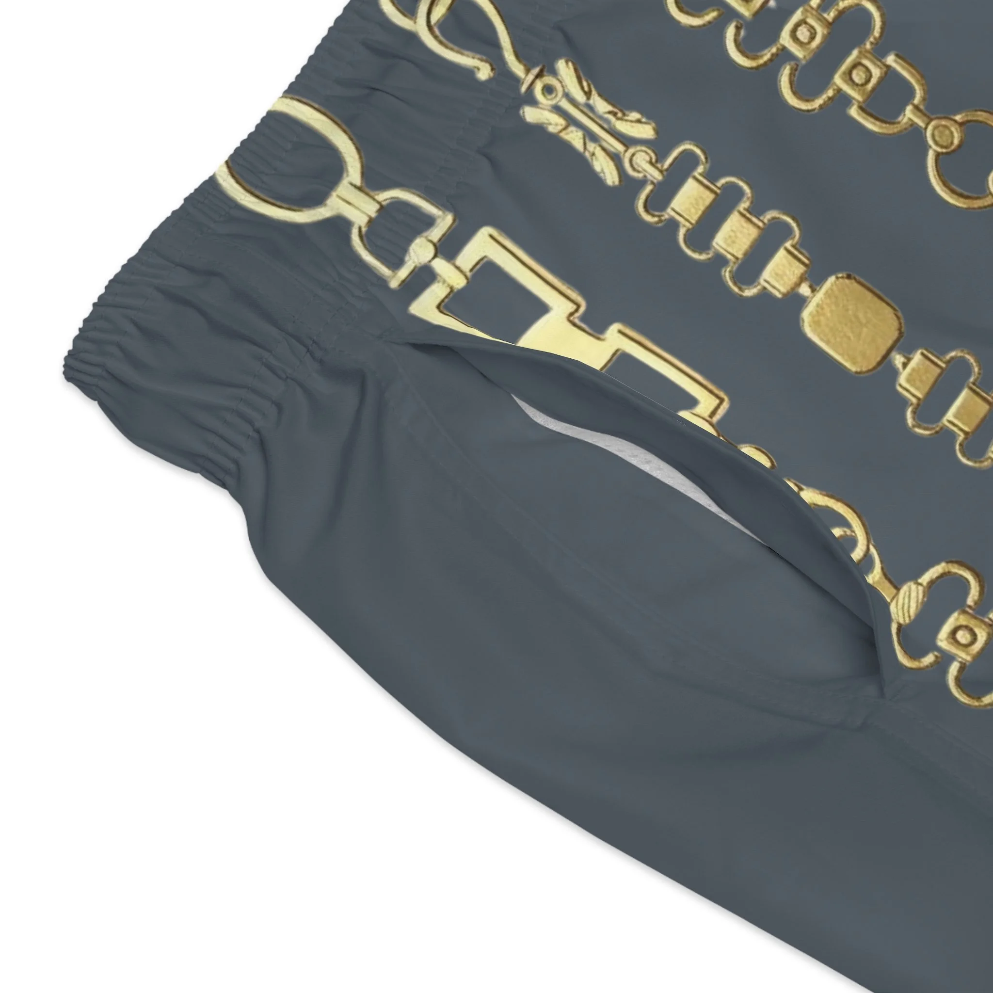 Close up of gold equestrian chain link all-over print on Hunt and Harbor men's luxury swim trunks