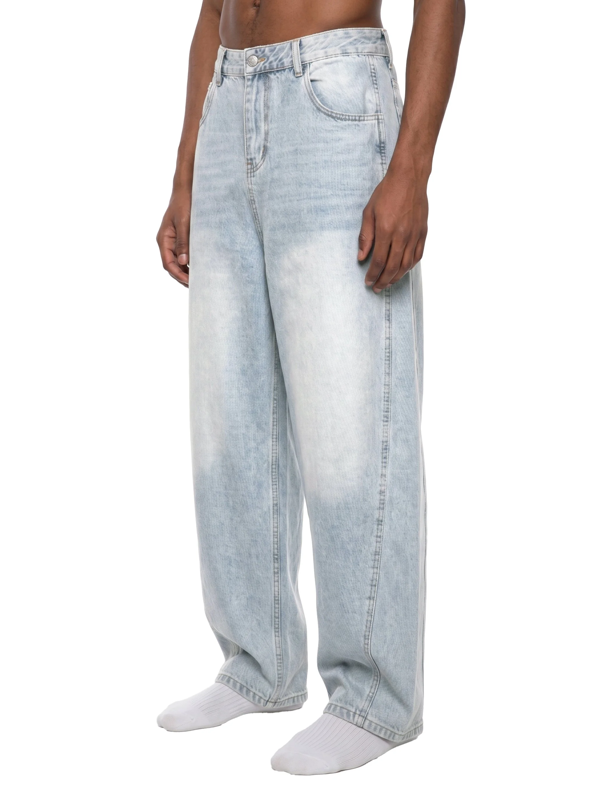 Men's sunfade barrel leg denim jeans worn on model - back view showing relaxed fit