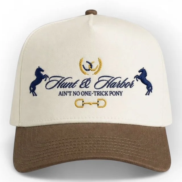 One-Trick Pony embroidered cap in Natural and Walnut brown - two-tone preppy snapback trucker hat with curved brim and embroidered logo