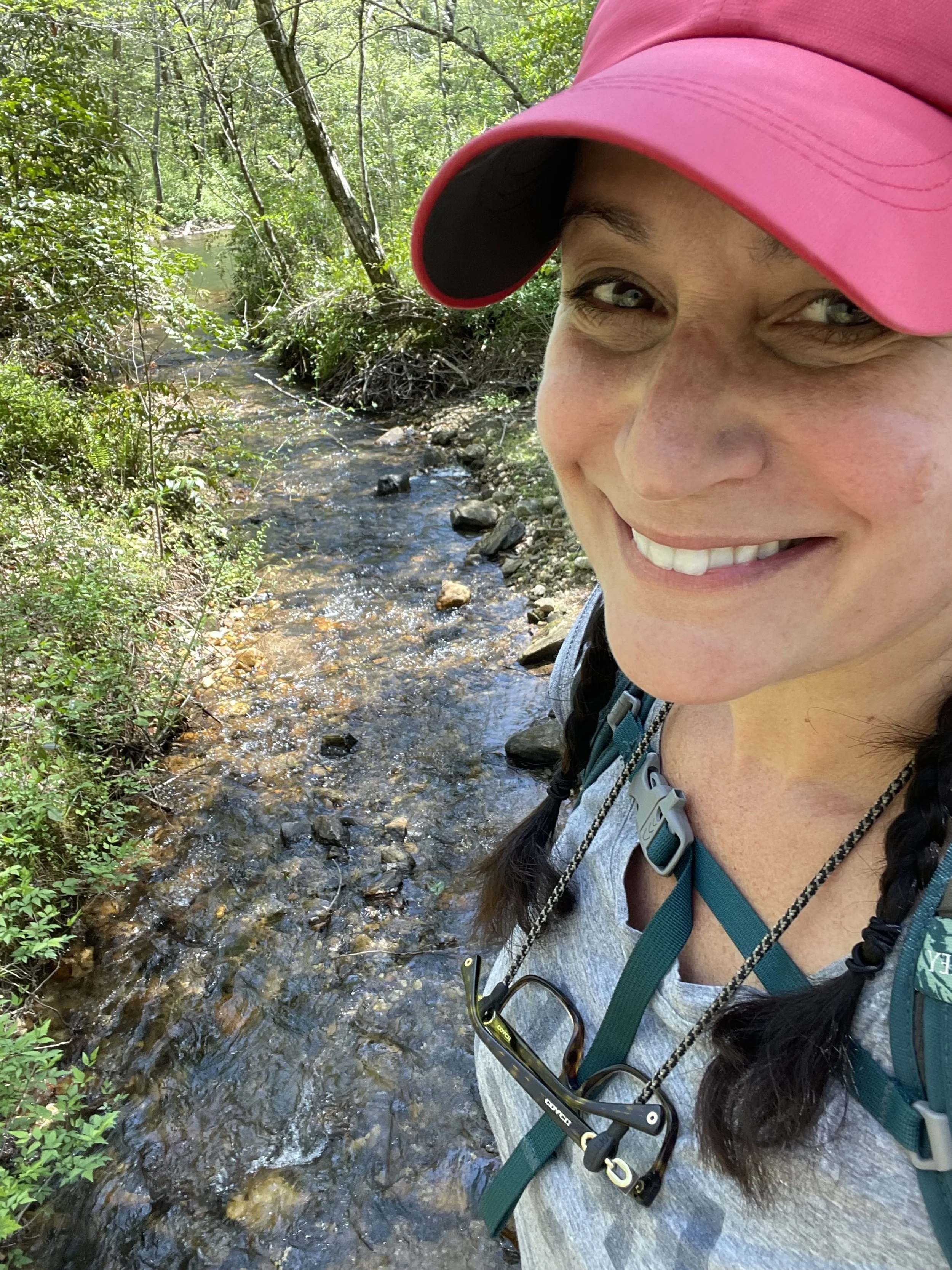 Melissa on one of her many hikes in the wilderness of the Appalachian Mountains. These hikes provide much of the inspiration for her paintings.