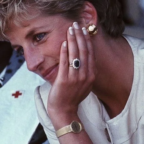 Princess Diana&rsquo;s striking blue sapphire engagement ring is one of the most iconic pieces of jewellery in Britain, and arguably the most famous engagement ring in the world.
- 12ct oval Ceylon sapphire surrounded by 14 round diamonds and set in 