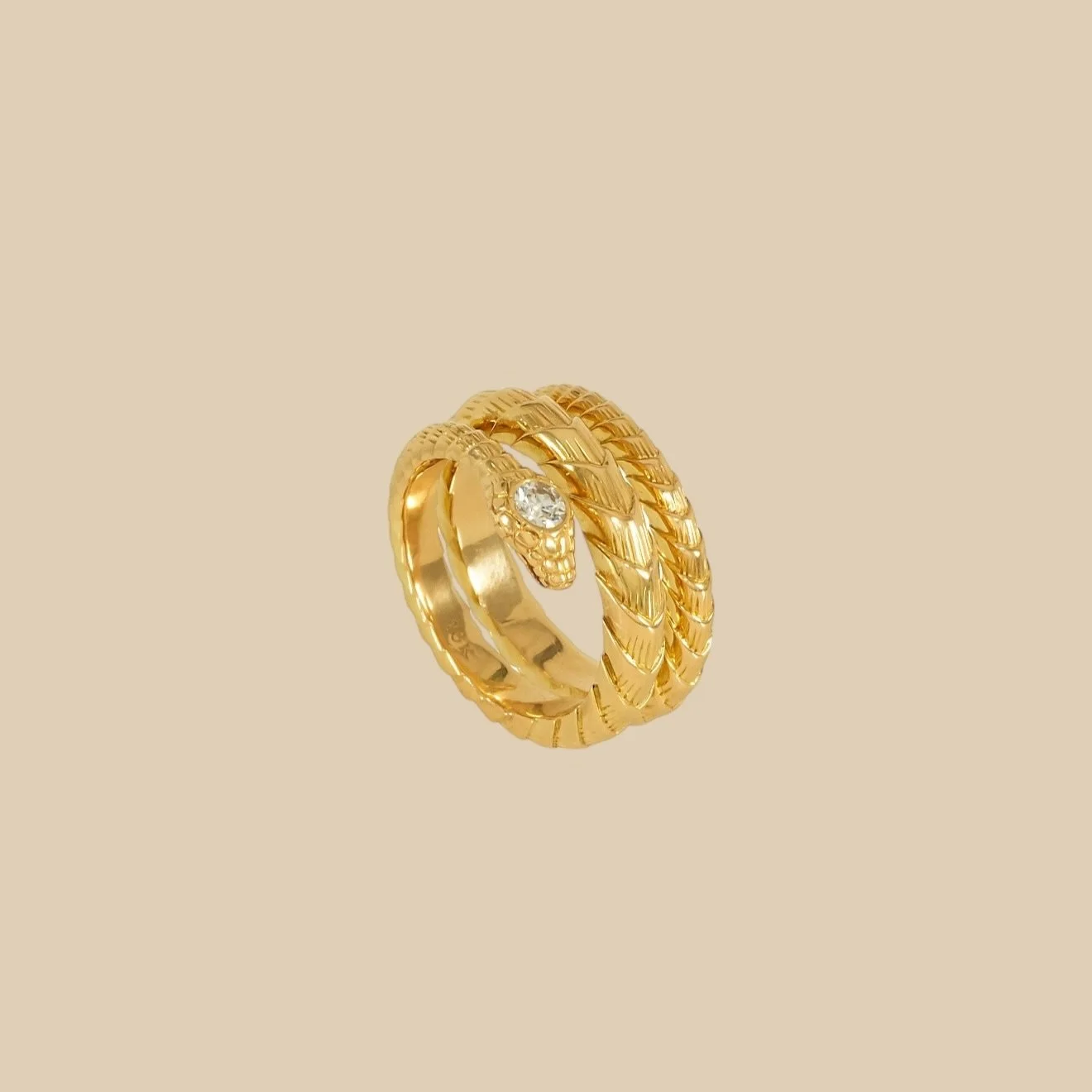A snake ring curls around the finger like a talisman&mdash;
a piece that holds stories older than jewelry itself.
Across eras, the serpent has meant protection, intuition, rebirth,
and unwavering loyalty.
Queen Victoria chose a serpent ring for her e