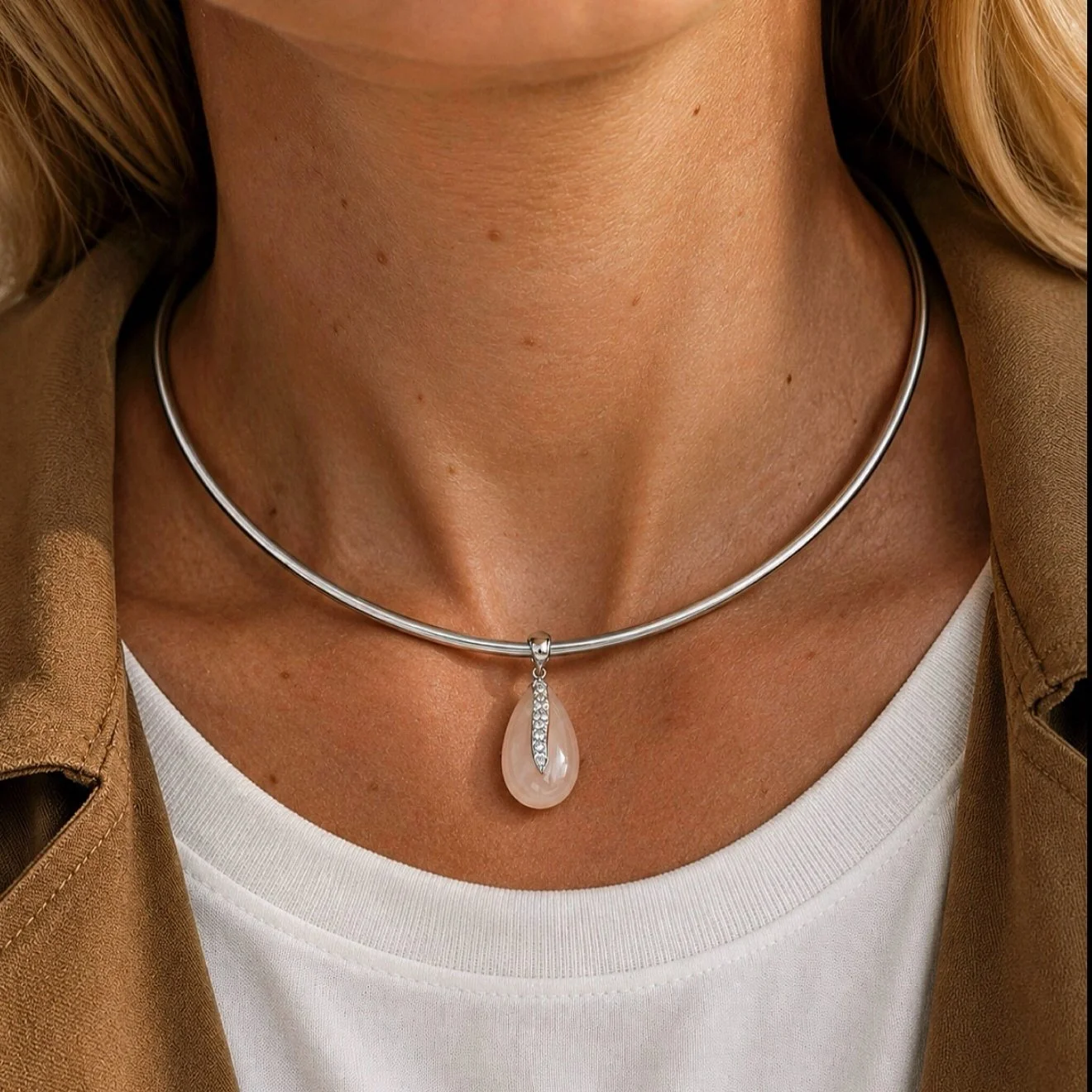 The moonstone holds its light within, and it only appears in motion.
Carved by hand from a single stone.
18k white gold, natural diamonds set into the moonstone itself.
I made it for the light we carry that no one sees until we move.