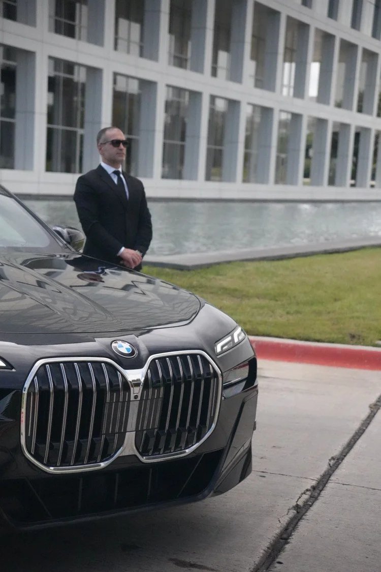 BMW 7 Series executive sedan with an MP Limousine chauffeur for a Grapevine headquarters visit