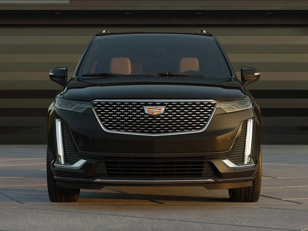 Black Cadillac XT6 business-class SUV