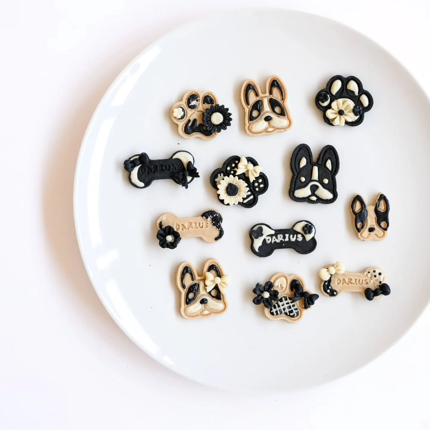 Black and white custom  bikkies for our lovely black-and-white Staffy friend @dariusthestaffy 🖤🤍
Made with chicken, lactose free cheese, and goat milk &mdash; nourishing with a teeny bit of indulgence.
Should we take custom bikkie orders more often