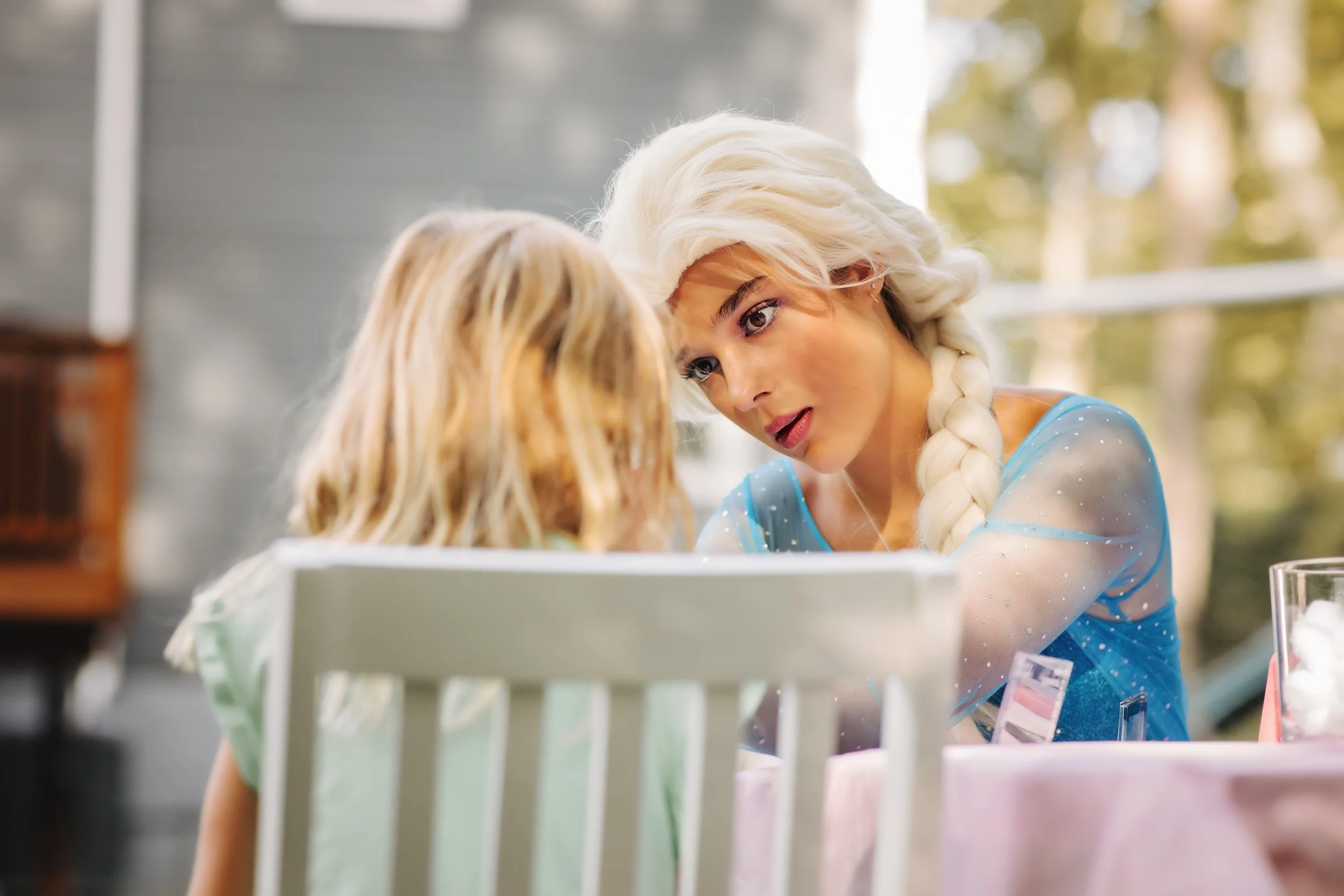 Princess applying makeup at girls birthday party