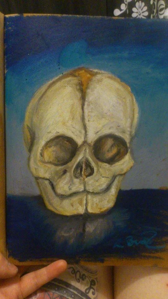 2016 - an oil pastel piece on paper treated with sunflower oil. I wanted to depict a foetal skull, as I find skulls to be incredibly beautiful. Underneath our skin, and all the superficial differences in us, we are all of us a death's head beneath th