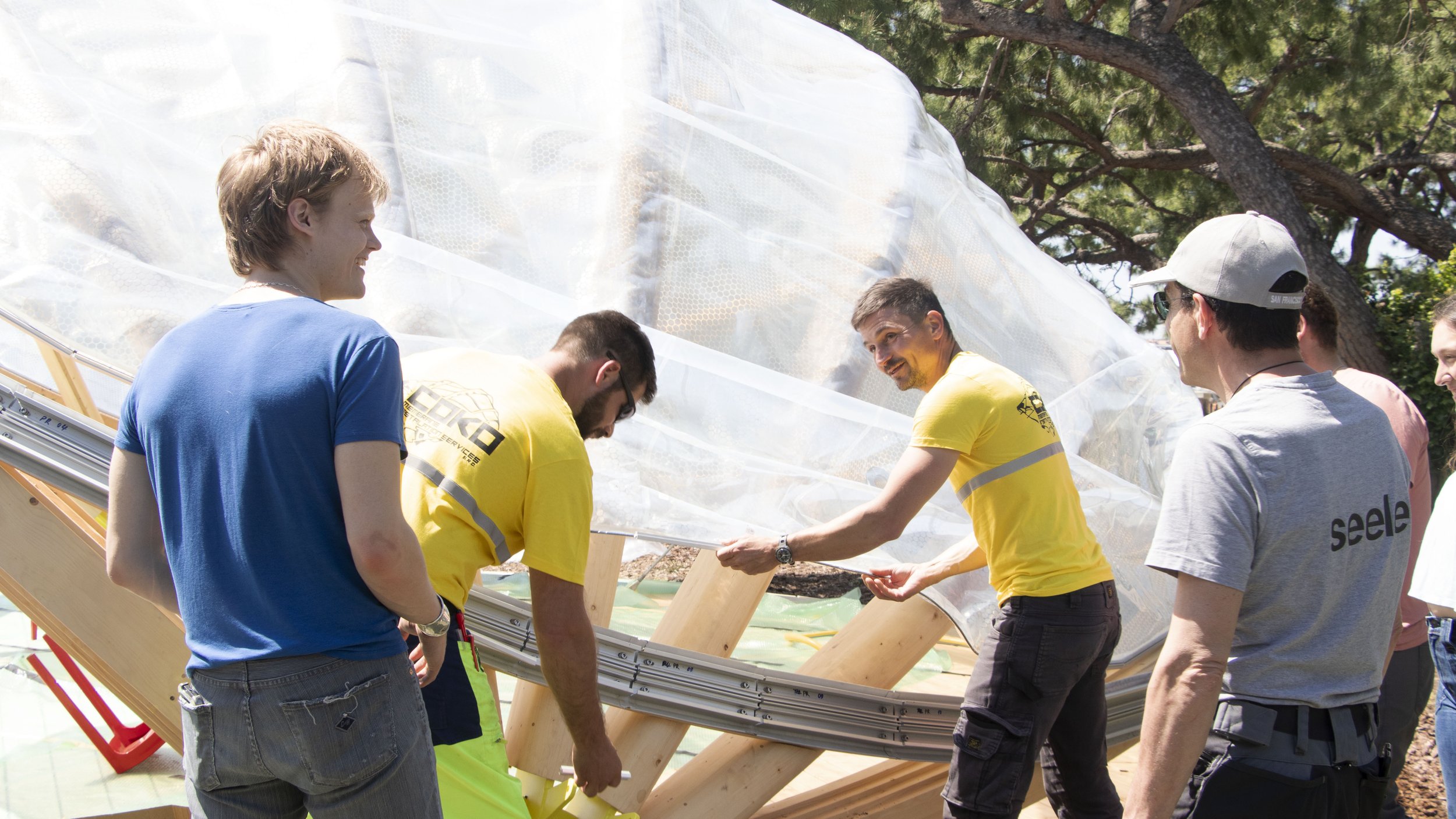         Attaching the ETFE to the aluminum brace