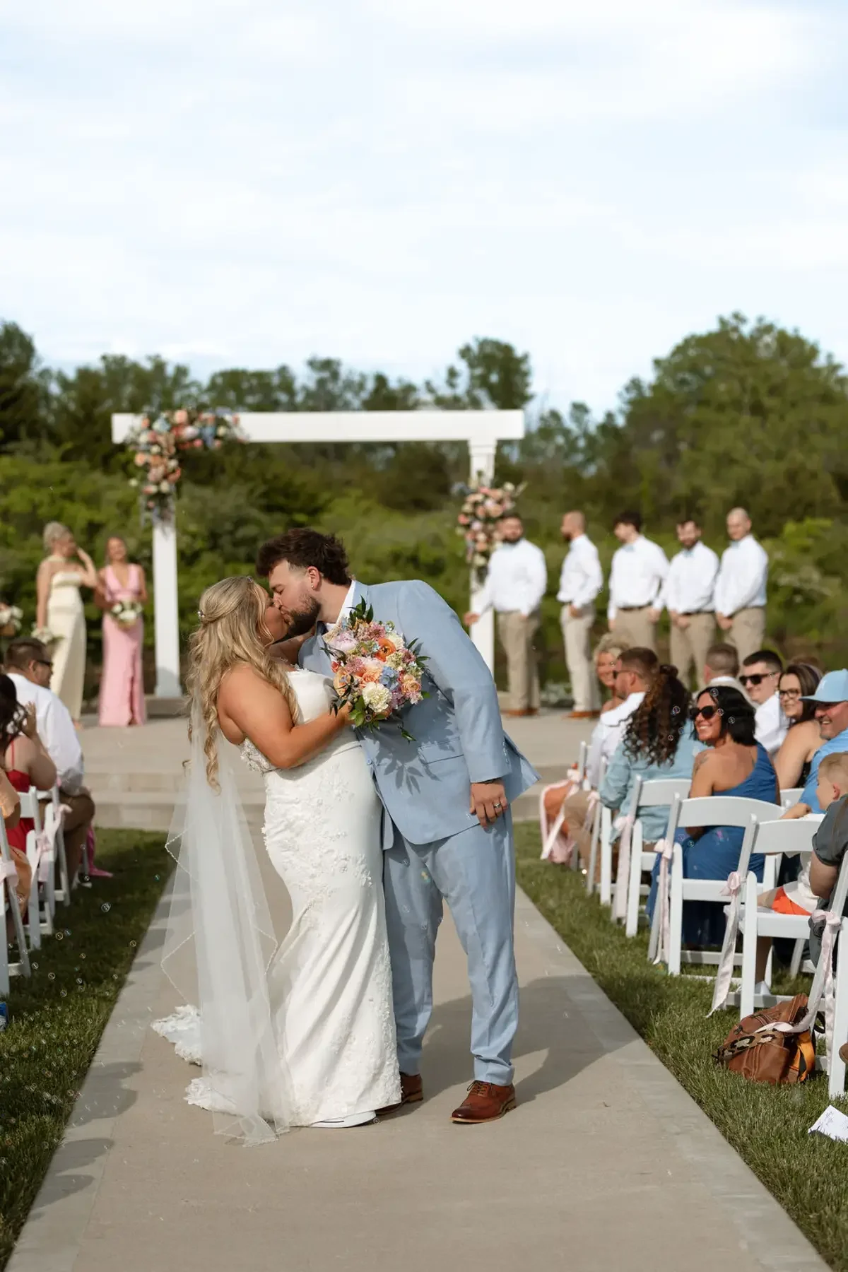 wedding-ceremony-fresh-florals.webp