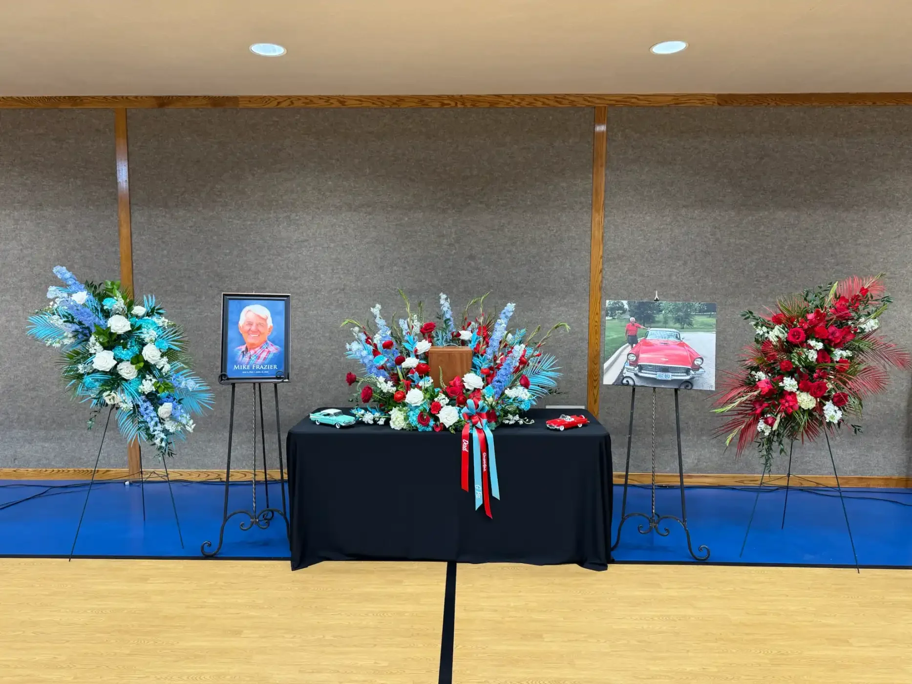 red-turquoise-classic-car-masculine-tribute-arrangements-with-urn-floral-stories.webp
