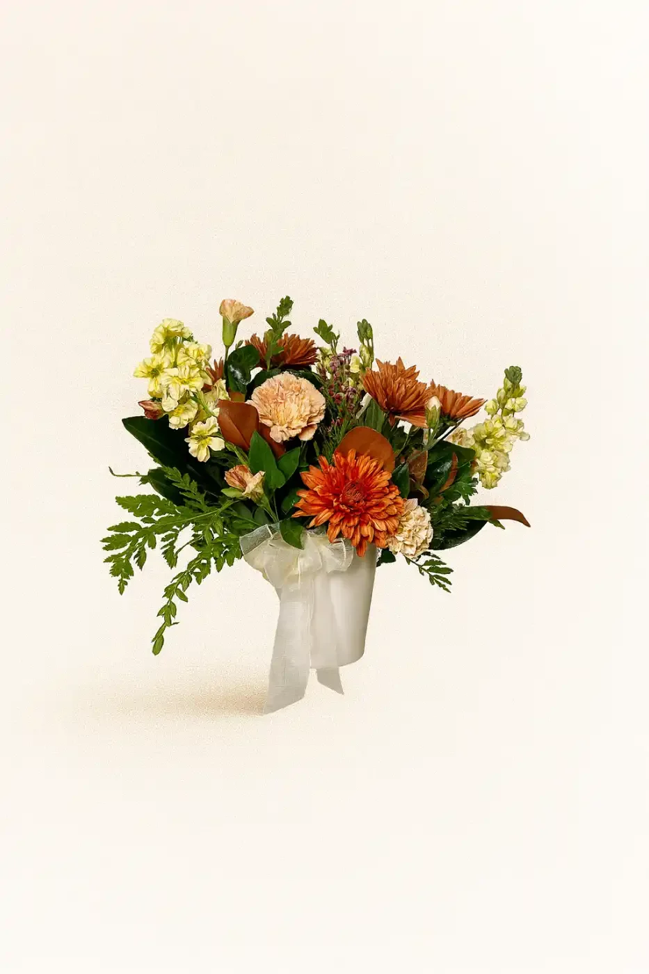 warm-autumn-sympathy-vase-with-orange-carnations-floral-stories.webp