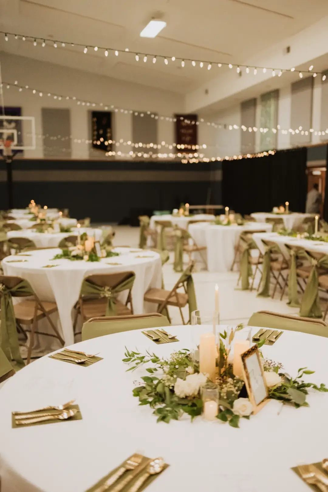wedding-reception-setup-string-lights-gym-transform-floralstories.webp