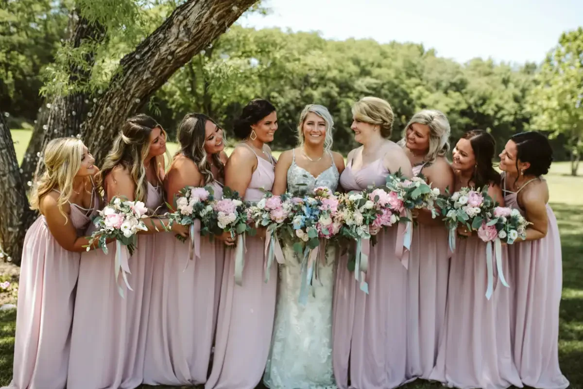 bridesmaid-bouquet-lineup-soft-pink-greenery-sycamore-tree-savannah-mo.webp