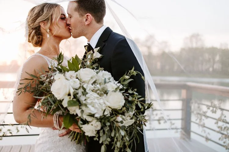 lush-white-bridal-bouquet-with-trailing-greenery-dock-portraits-floral-stories.jpeg