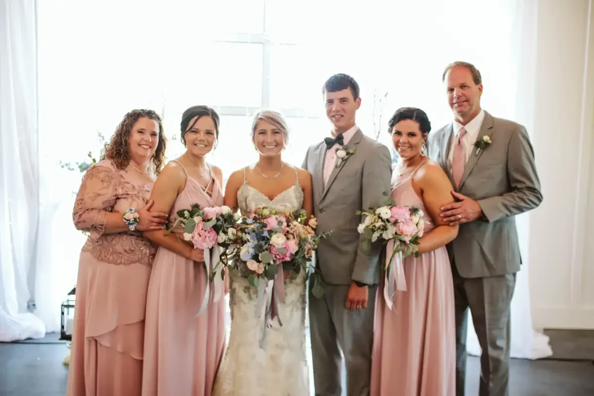 family-wedding-photo-soft-romantic-florals-sycamore-tree-savannah-mo.webp