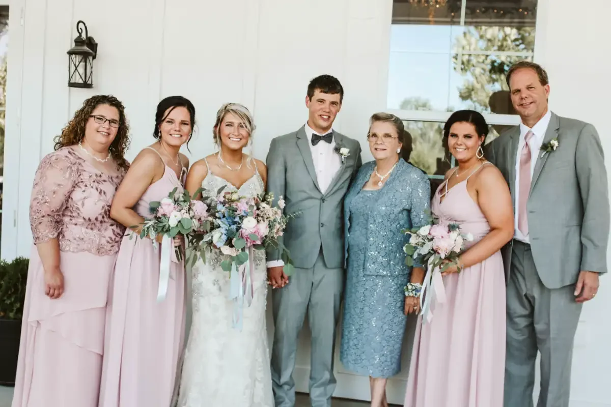 bride-groom-family-photo-grandparents-wedding-portrait-sycamore-tree.webp