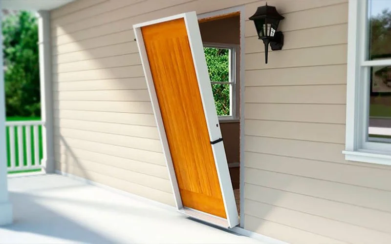 Handyman installing exterior door in Edmond Oklahoma