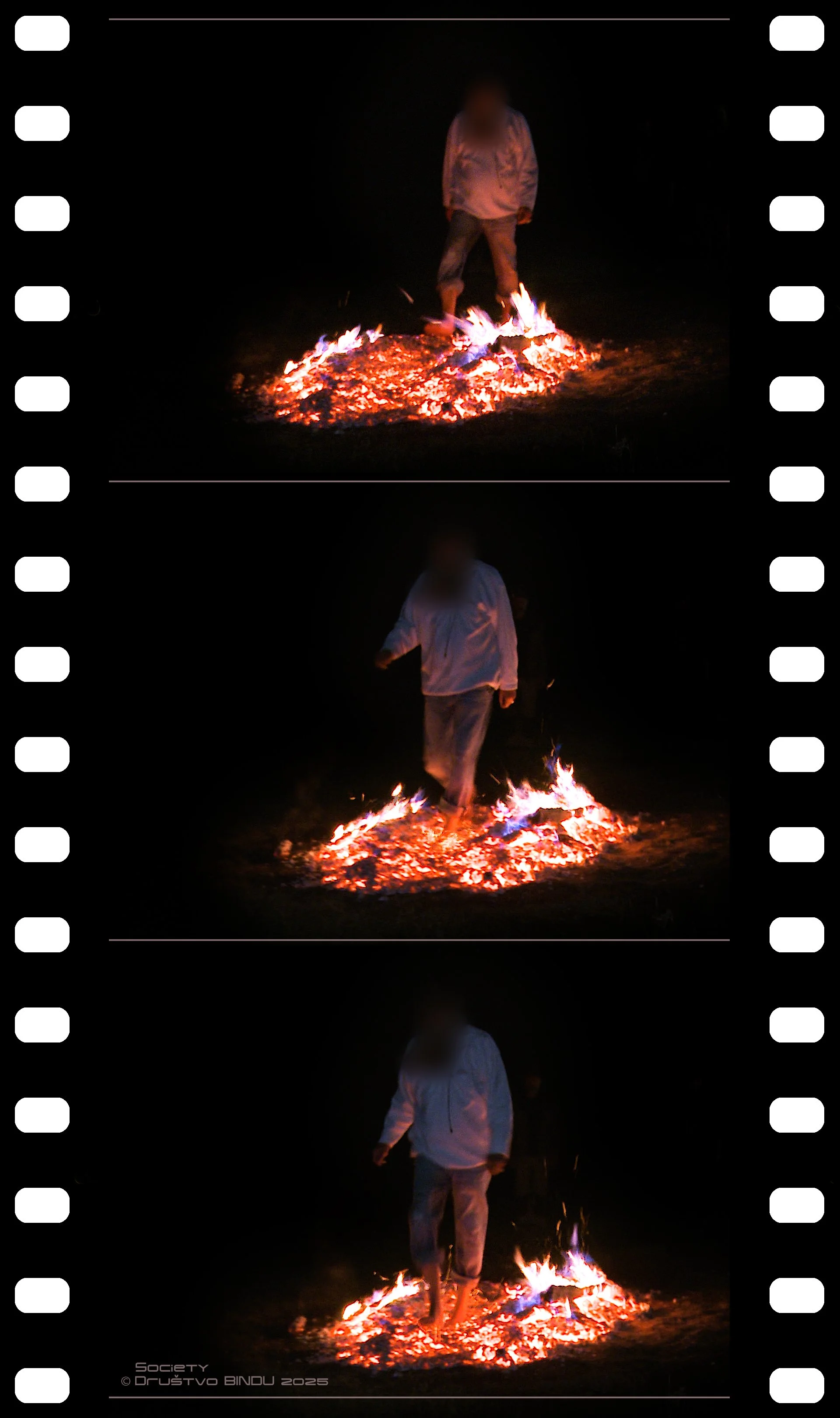 Person standing in a circle of fire at night, with their face blurred, wearing light-colored clothing.