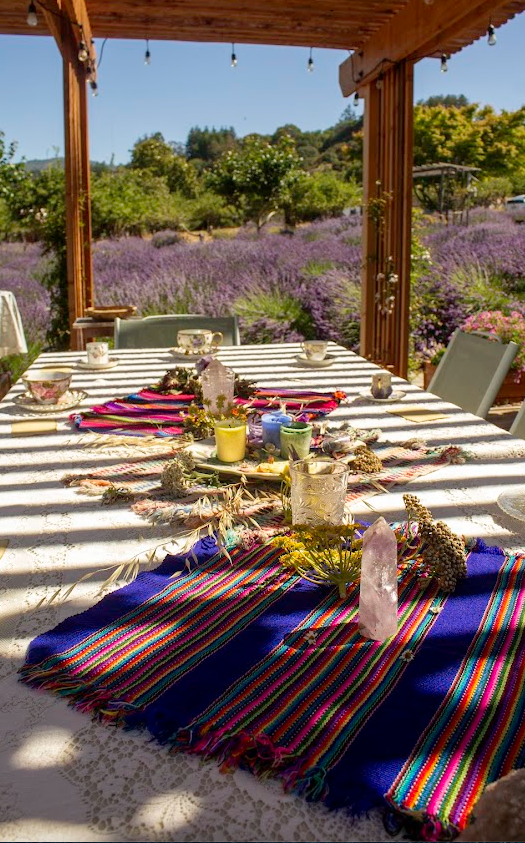 beautiful table set with tea ware in a lavender field