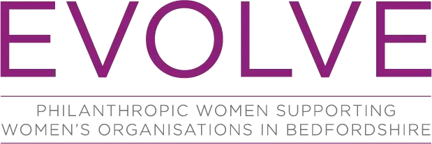 Partial view of the word 'EVOLVE' in purple and black text.