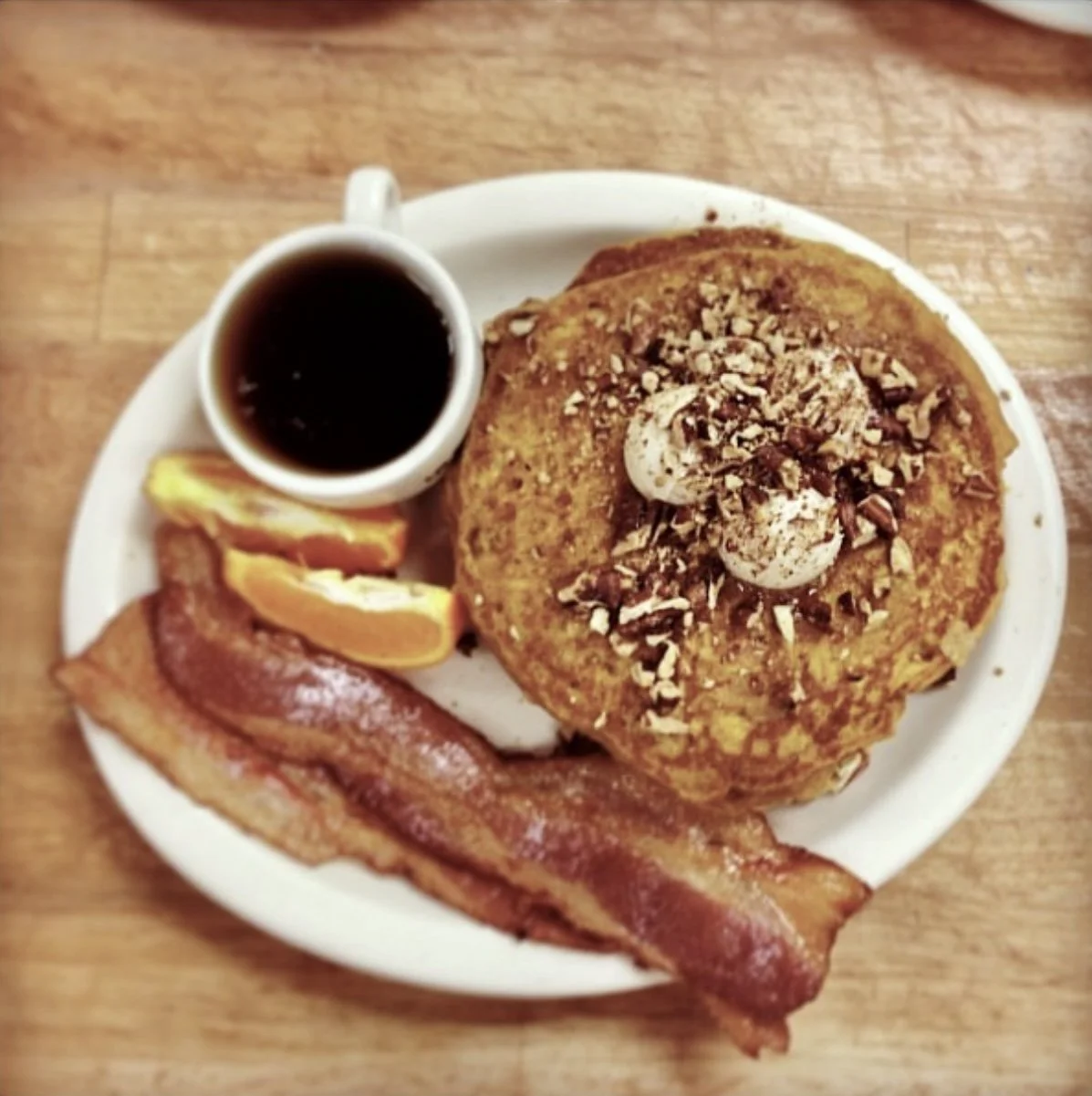'Locals' Pancake Breakfast--  Cinnamon Pancakes, Stewed Apples, Honey Butter, and Toasted Pecans