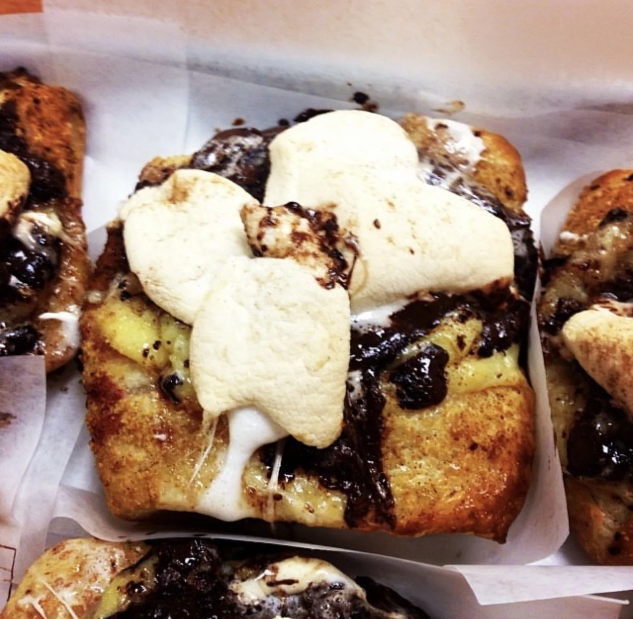 Smores Tart-- Puff Pastry, Graham Cracker, Pastry Cream, Chocolate Chunks, Cinnamon & Marshmallow