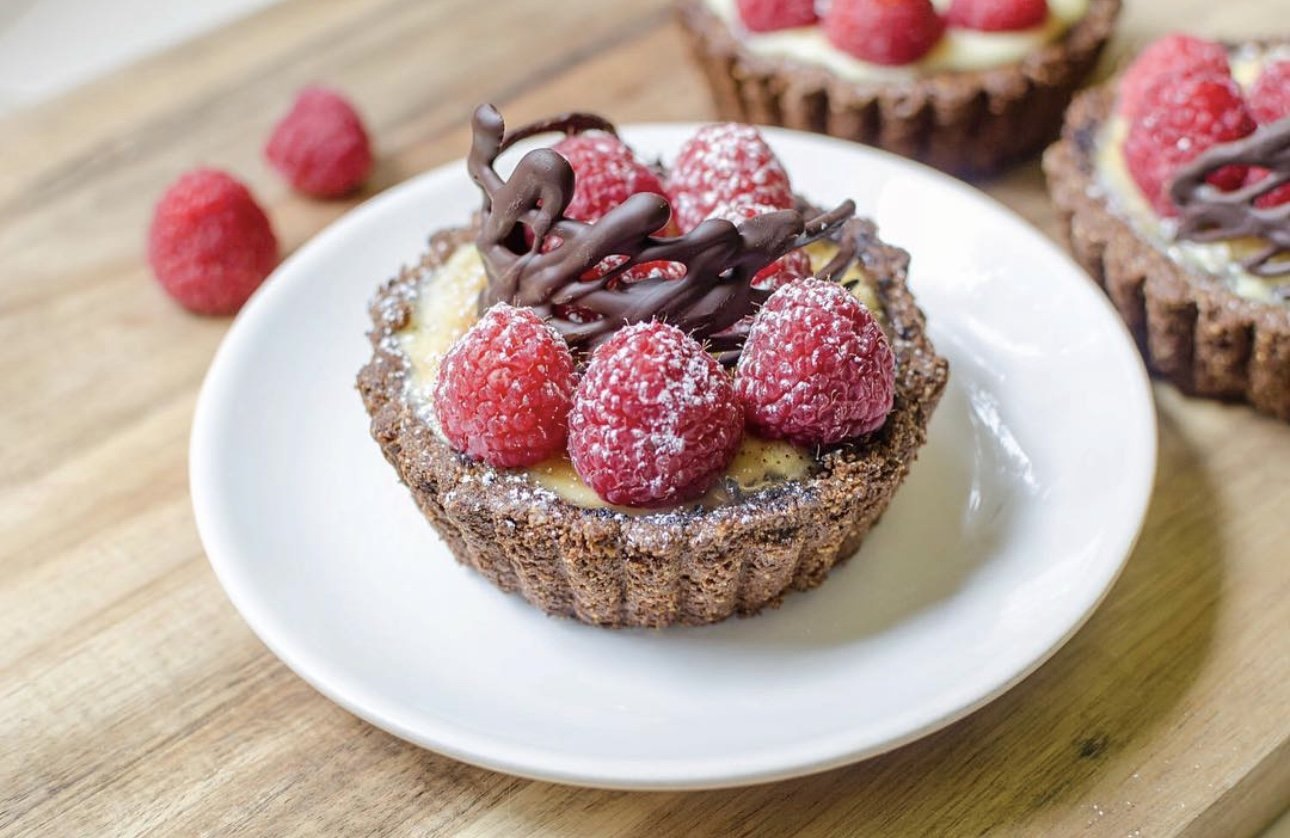 Gluten Free Creme Brulee Tarts with Raspberry Layer & Chocolate Garnish