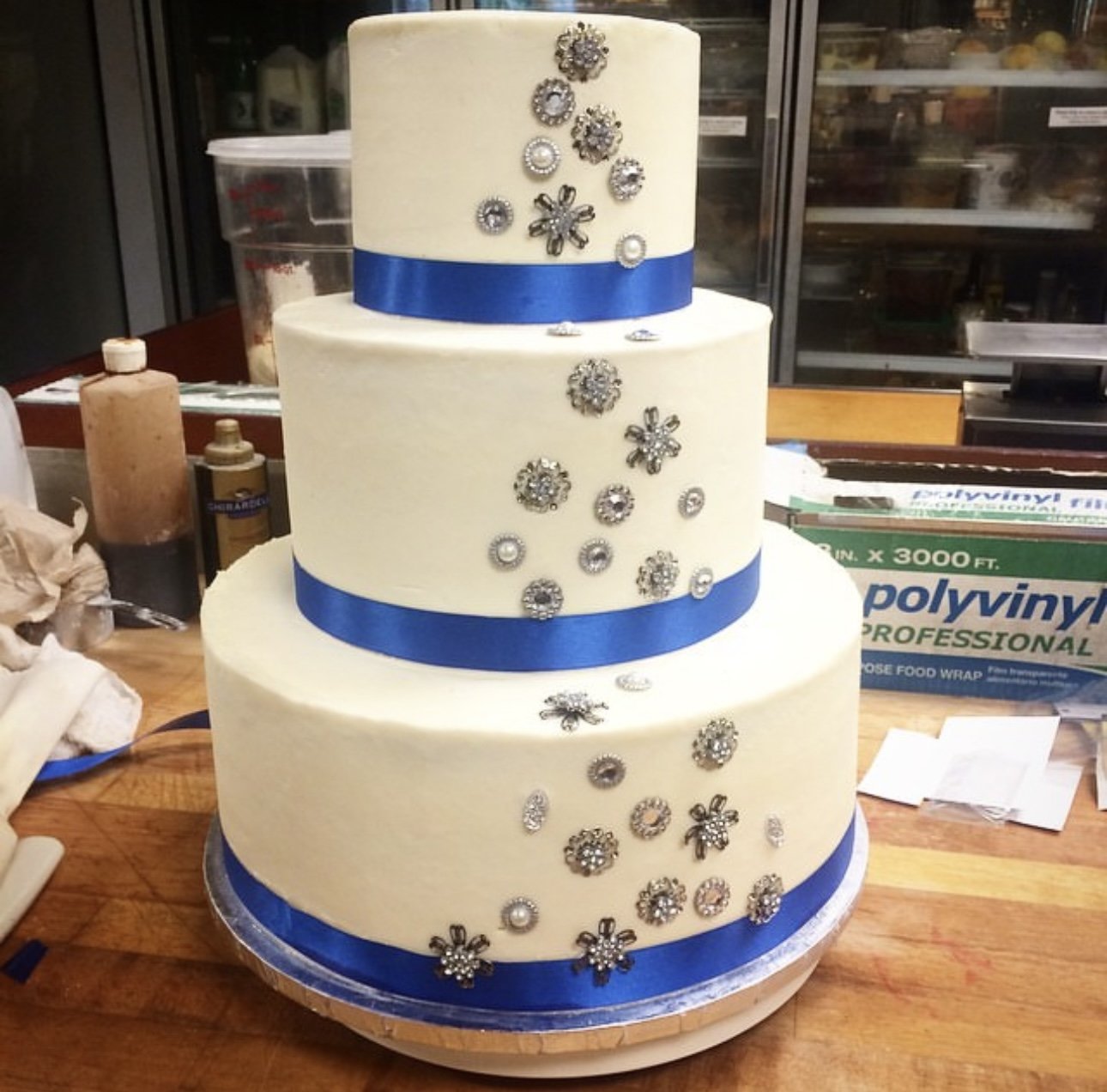 Blue Ribbon Wedding Cake with ornaments