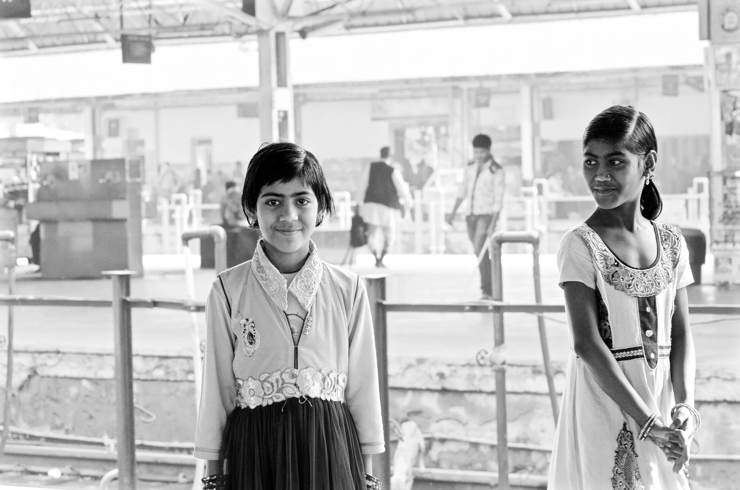 Two friends at the train station