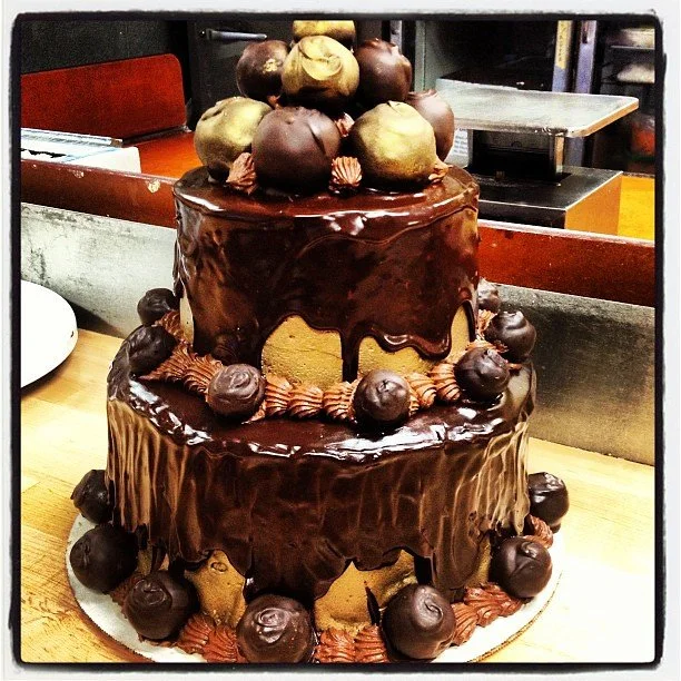 Gluten Free Chocolate Cake with Raspberry Filling, Chocolate Buttercream, Ganache and Almond Truffles