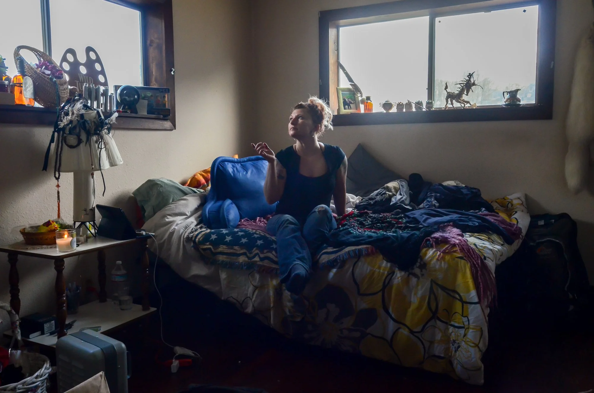 Young Woman in Bedroom