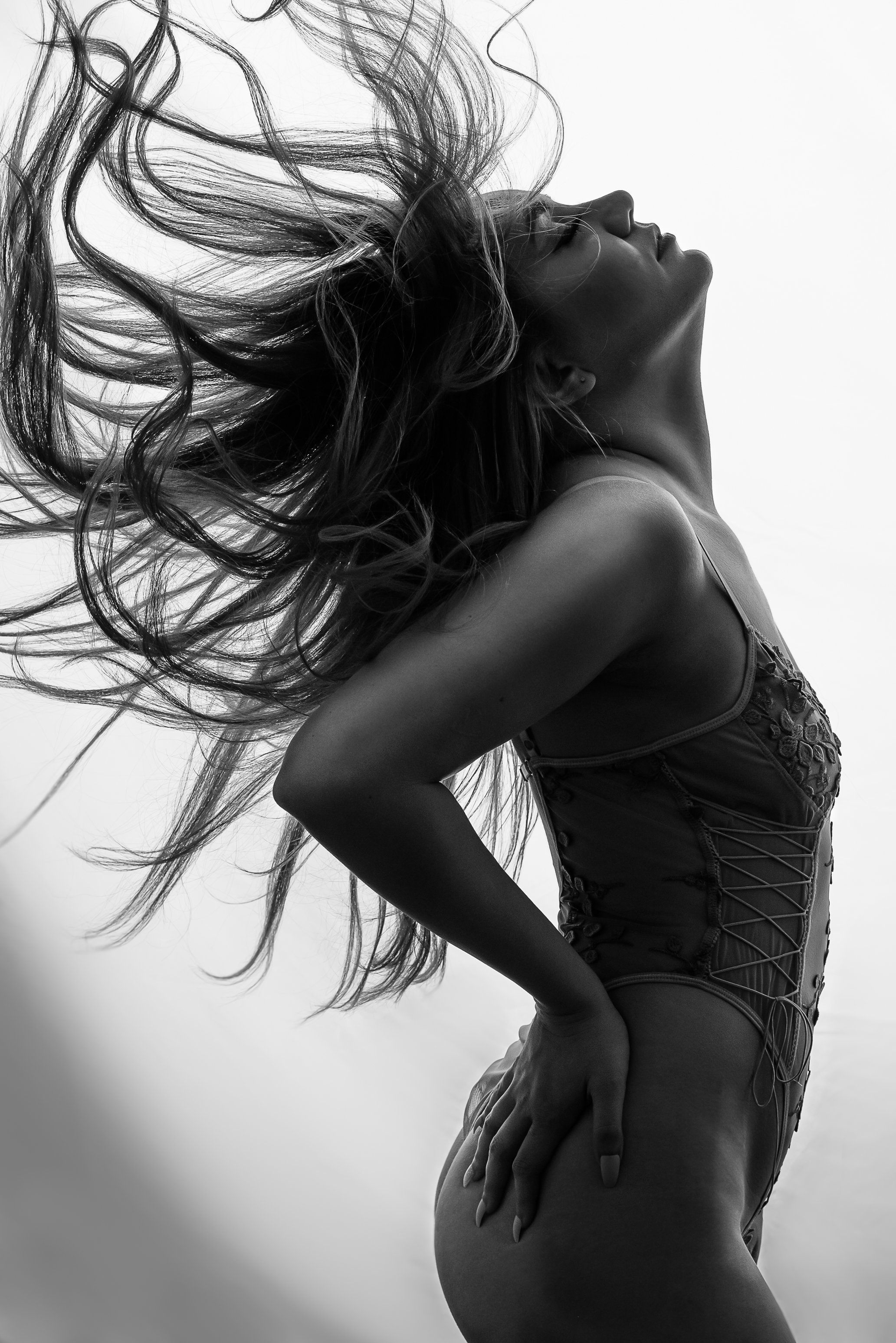 PortraitMastersBlackandWhiteGirlFlippingHairinLingeriePhoto.JPG