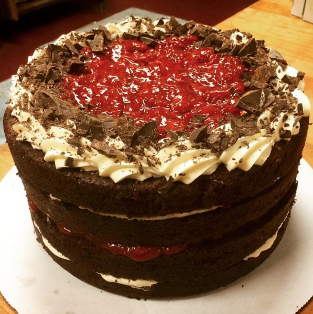 Red Velvet Cake with Strawberries, Crushed Chocolate, and Cream Cheese Icing