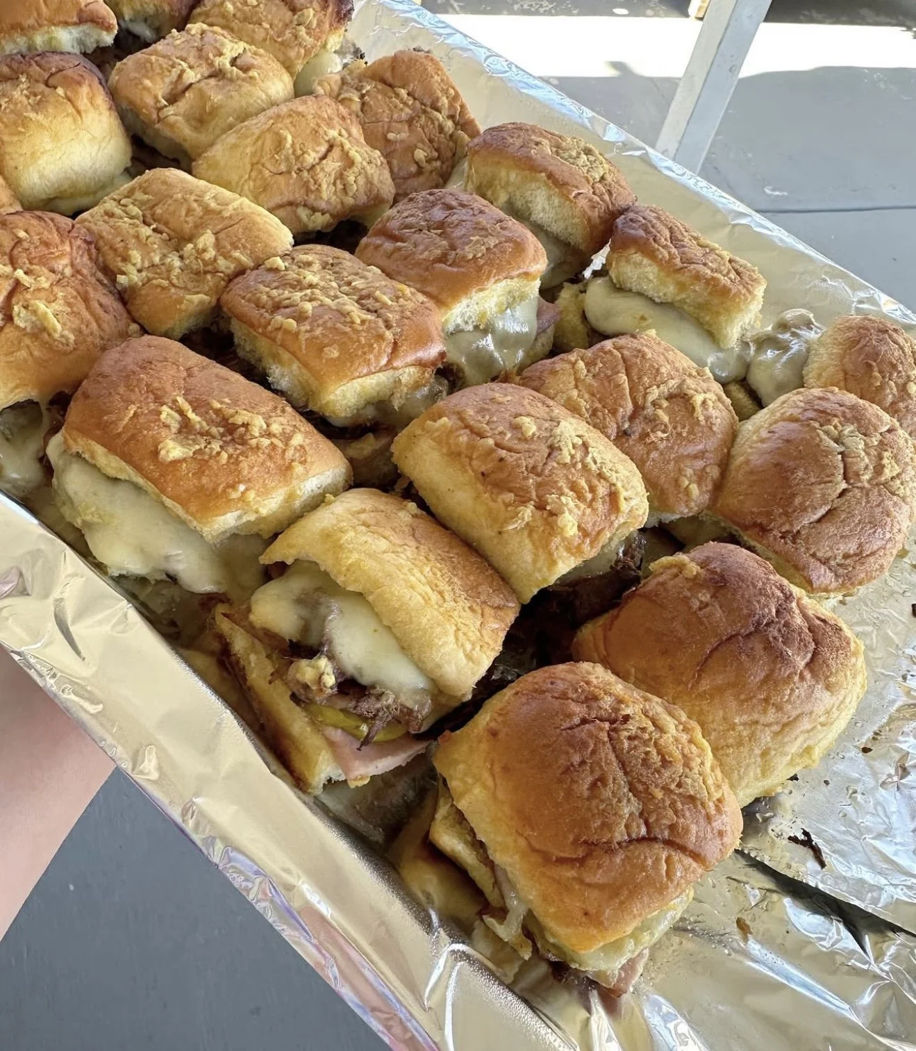 Roi Choi's Cubano Sliders-- Roasted Pork, Ham, Pickle, Provolone & Swiss, Covered in Mustard Sauce & Minced Onion