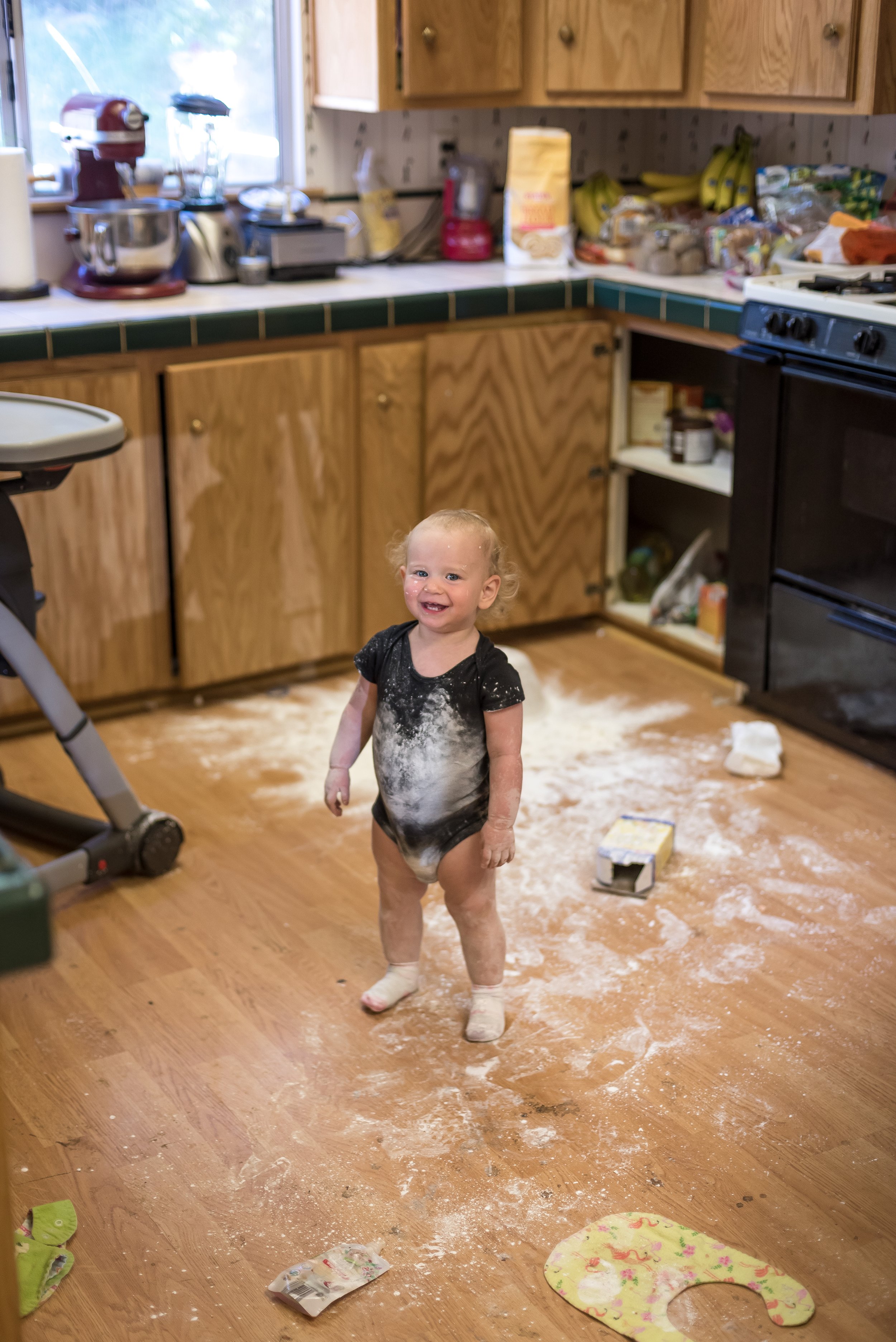 FlourExplosionToddlerinKitchen.JPG