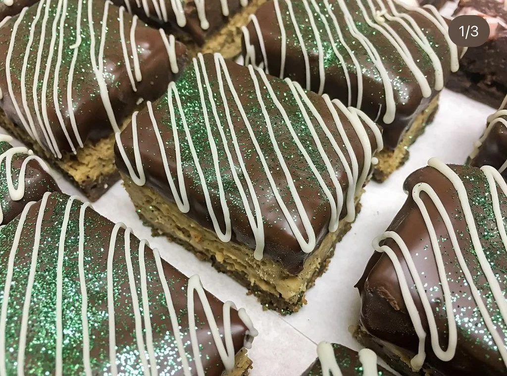 Pumpkin Bars with Gingerbread Crust dipped in Chocolate, White Chocolate Drizzle
