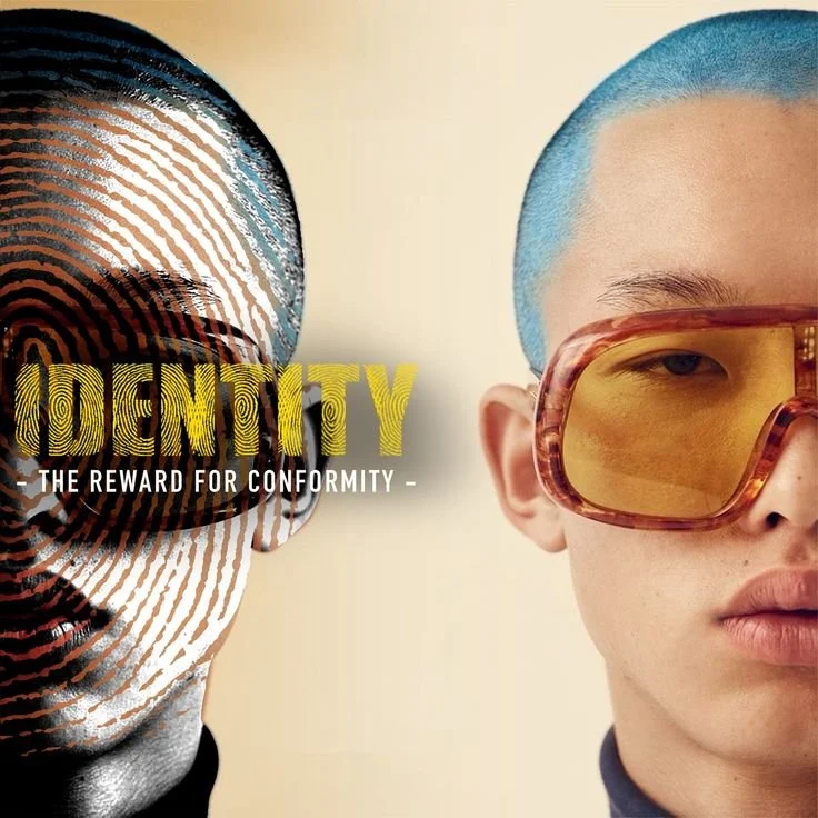 Close-up of two young individuals with distinctive hairstyles, one with a black and white striped hairstyle on the left and the other with a blue hairstyle on the right, wearing large tinted glasses, with the word "IDENTITY" and the slogan "The rewar