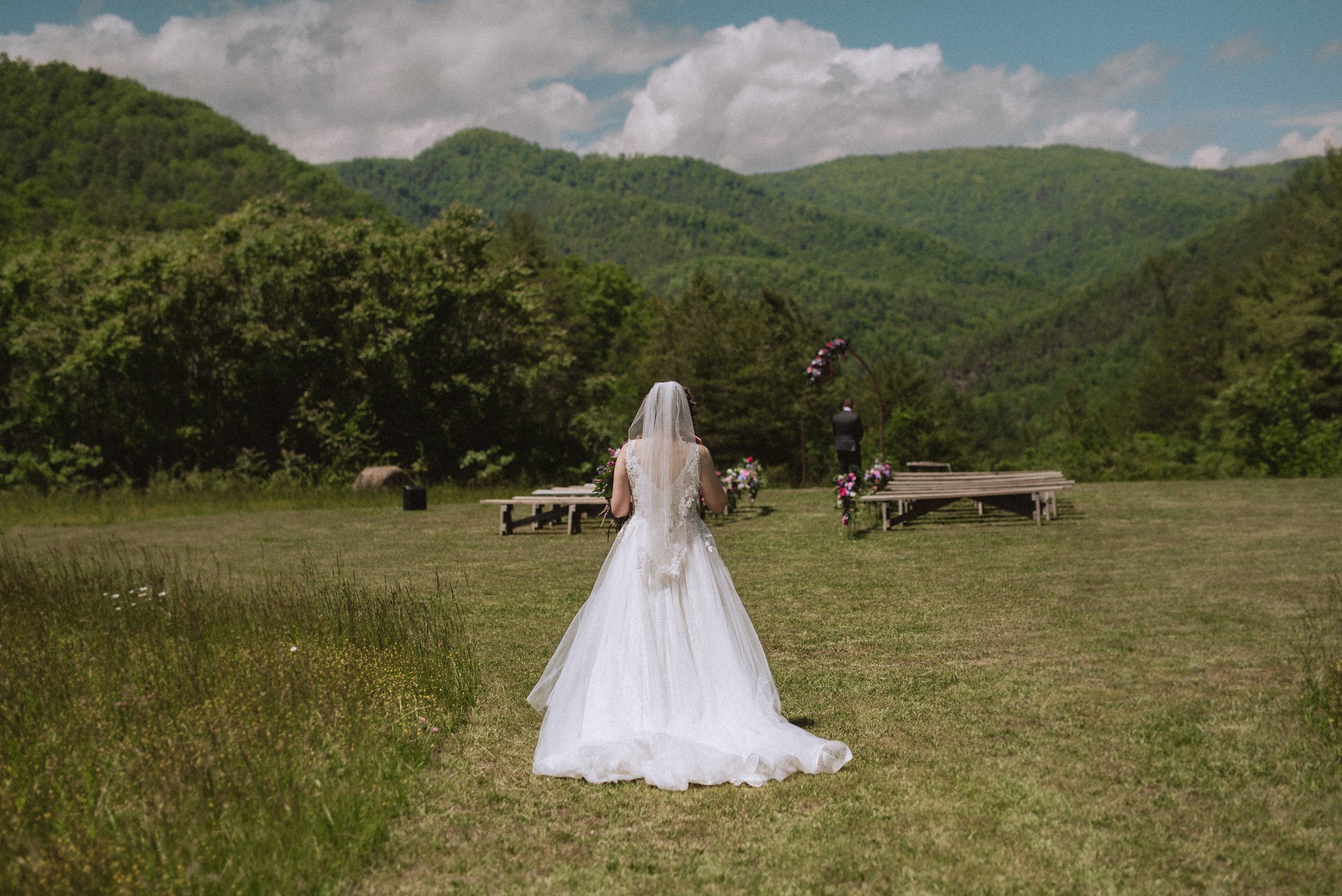 Some sneaks from Hayley + Ben's mountain wedding!! @paintrockfarm was incredible! And this sweet couple was surrounded by so much love on this intimate day!! 
.
Let's bring back authentic weddings ❤️
.
#mountainwedding #elopementwedding #elopementpho