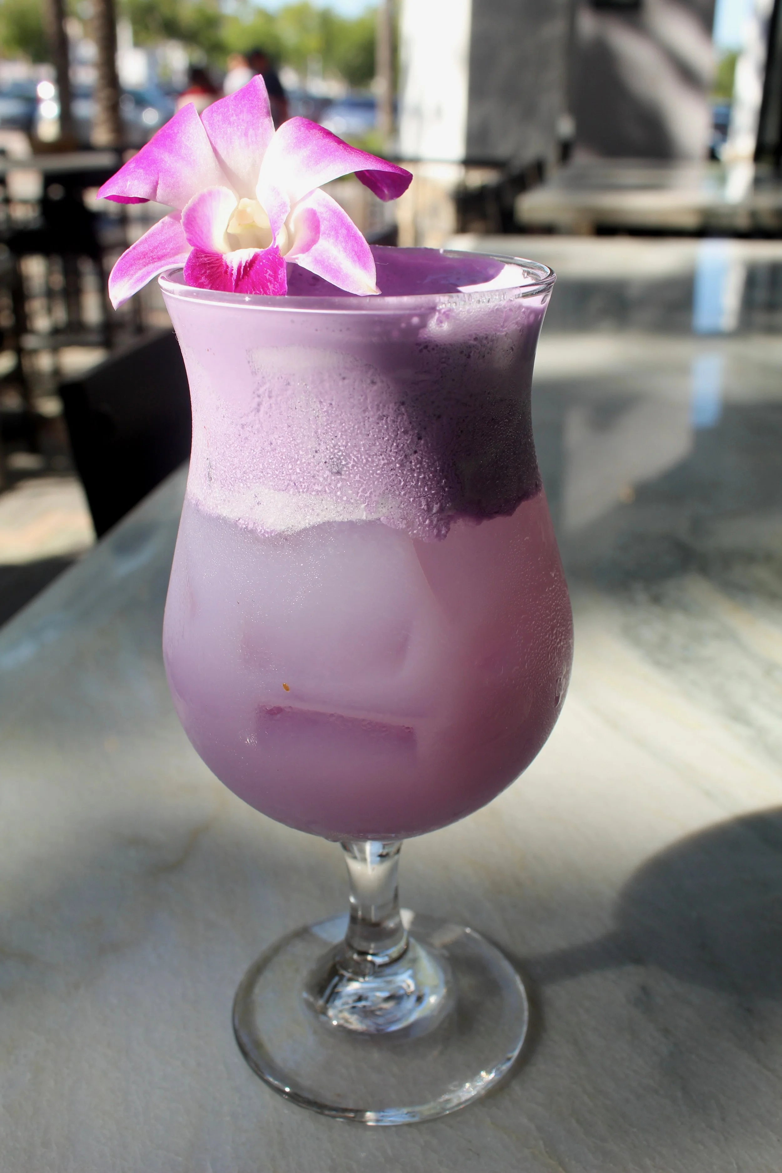 Ube Glow: A luminous blend of vodka with the creamy richness of ube and coconut, lifted by bright lemon juice and the subtle spice of ginger, and topped with a cloud of ube foam.
