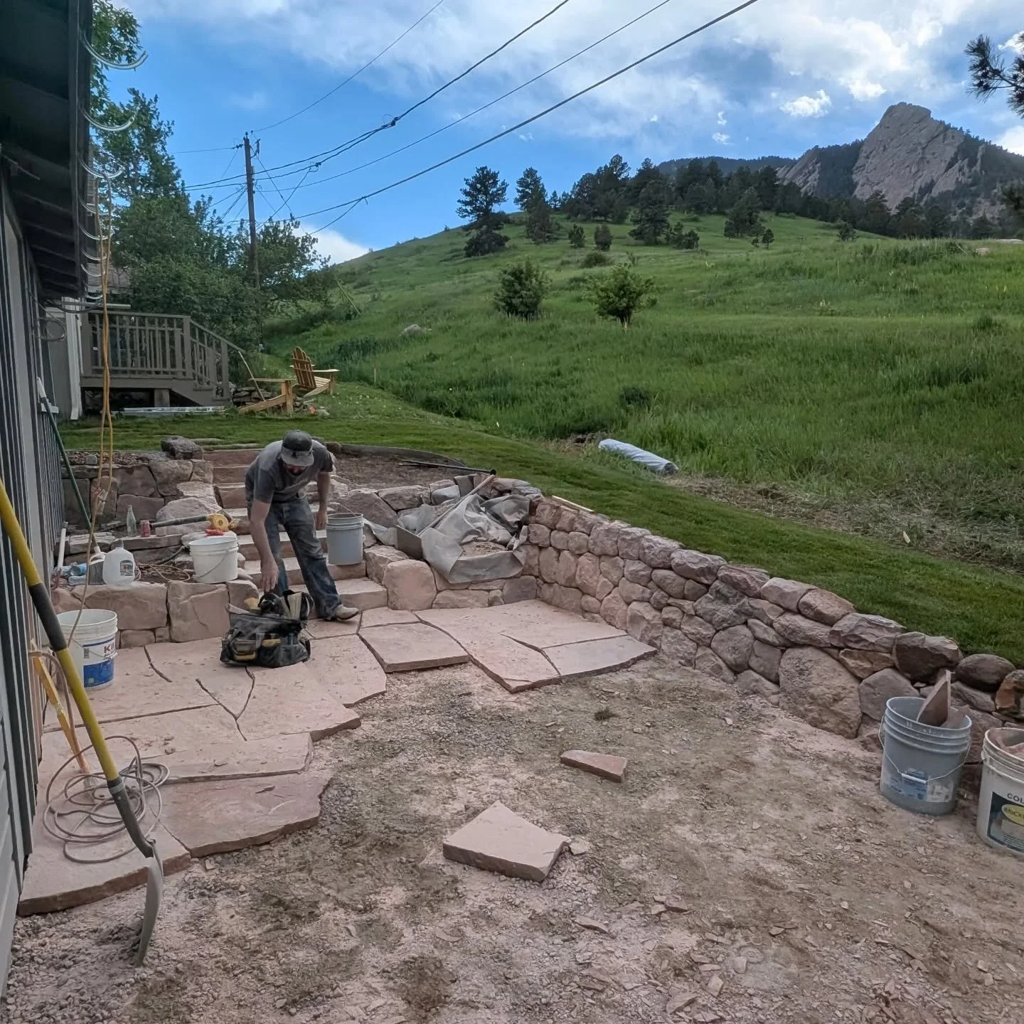 Chautauqua cottage final push. If you hire 3 masons they might be able to keep up with us and set a patio in a day and a half...