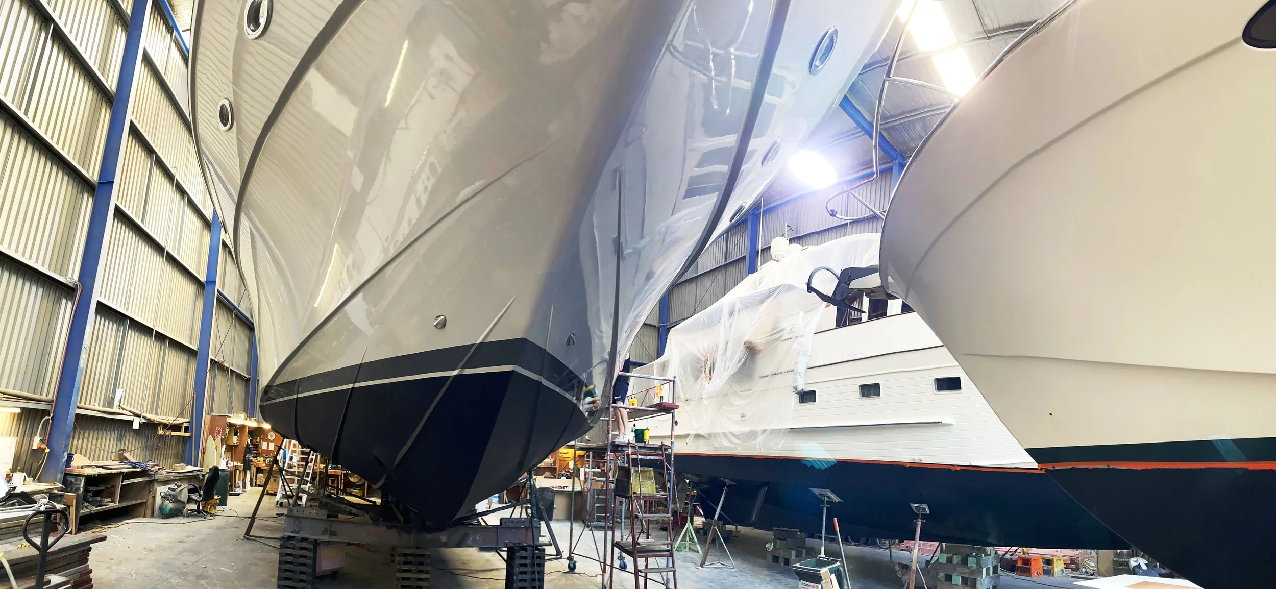 Three luxury yachts in the Brin Wilson Shed