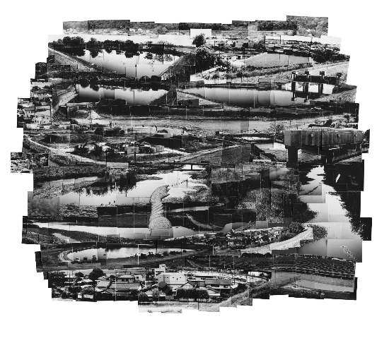 パズルのように分解された都市の風景のモノクロ写真