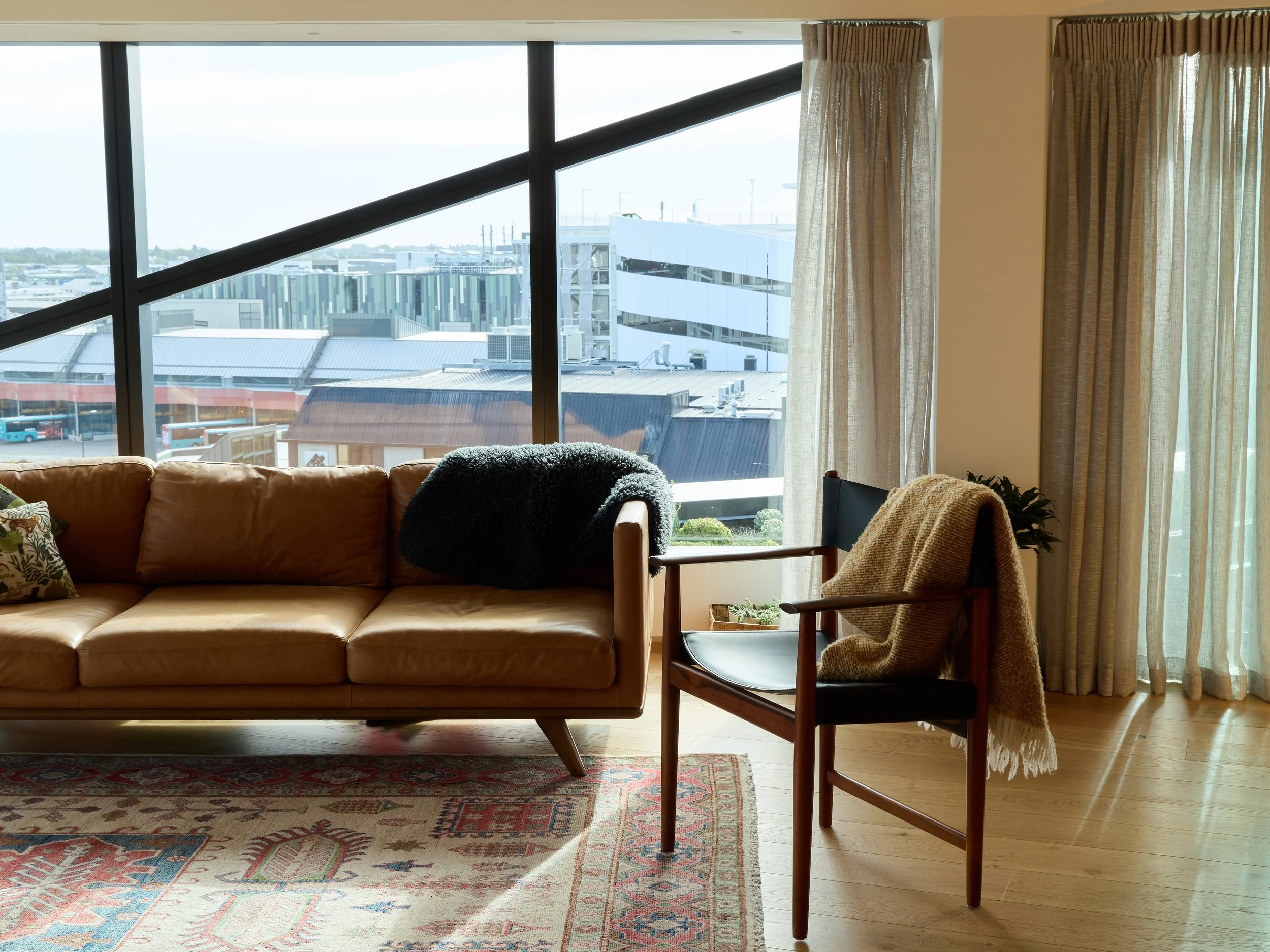 City Residence Ōtautahi Christchurch – Level 6 city apartment with folding roof and Port Hills views by AW Architects (2026)