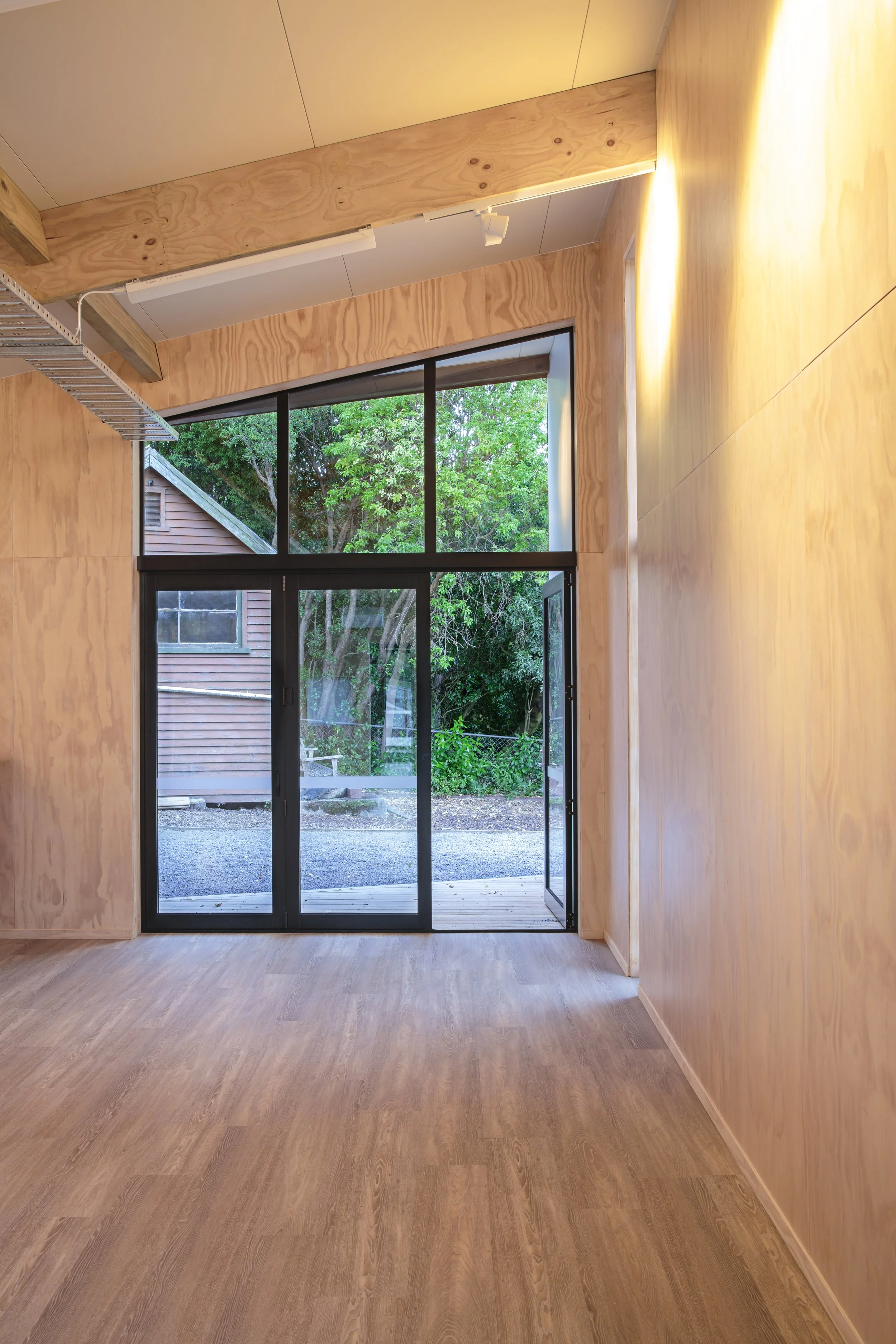 Governors Bay Community Centre – harbour-side Christchurch community building with cedar and steel cladding by AW Architects (2017)