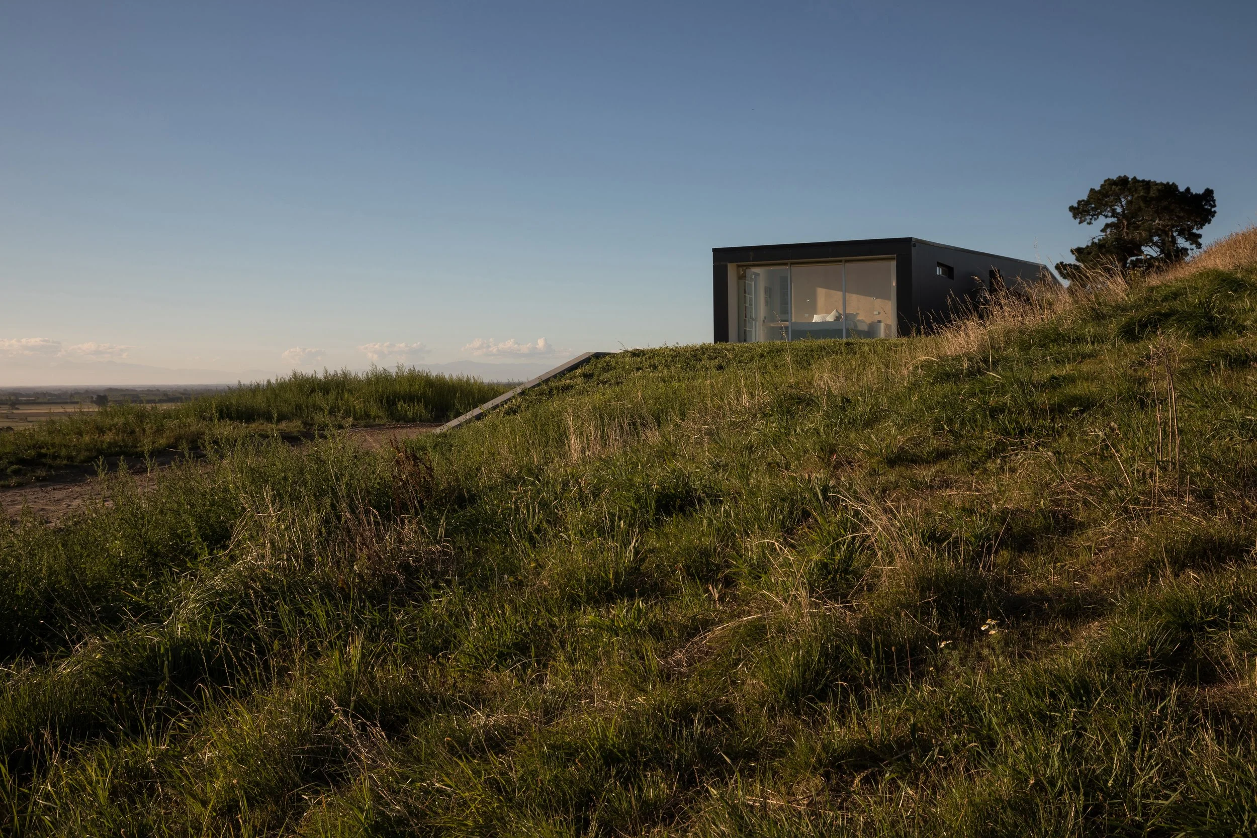 Tai Tapu Port Hills sculptural house with Swiss Pearl cladding – AW Architects