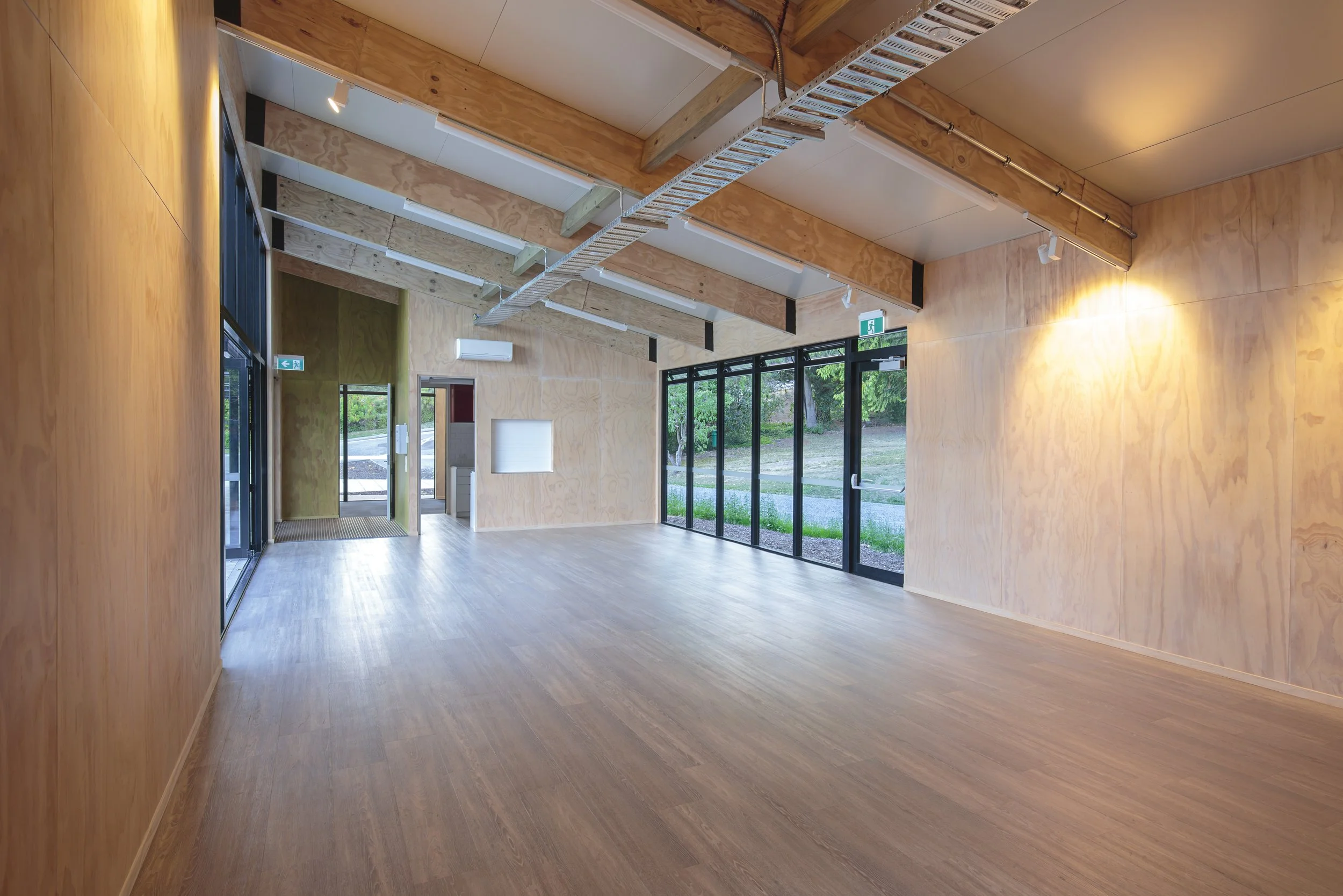 Governors Bay Community Centre – harbour-side Christchurch community building with cedar and steel cladding by AW Architects (2017)